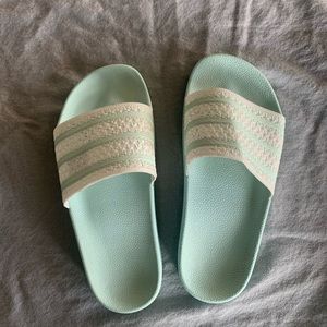 Tiffany and white adidas slides